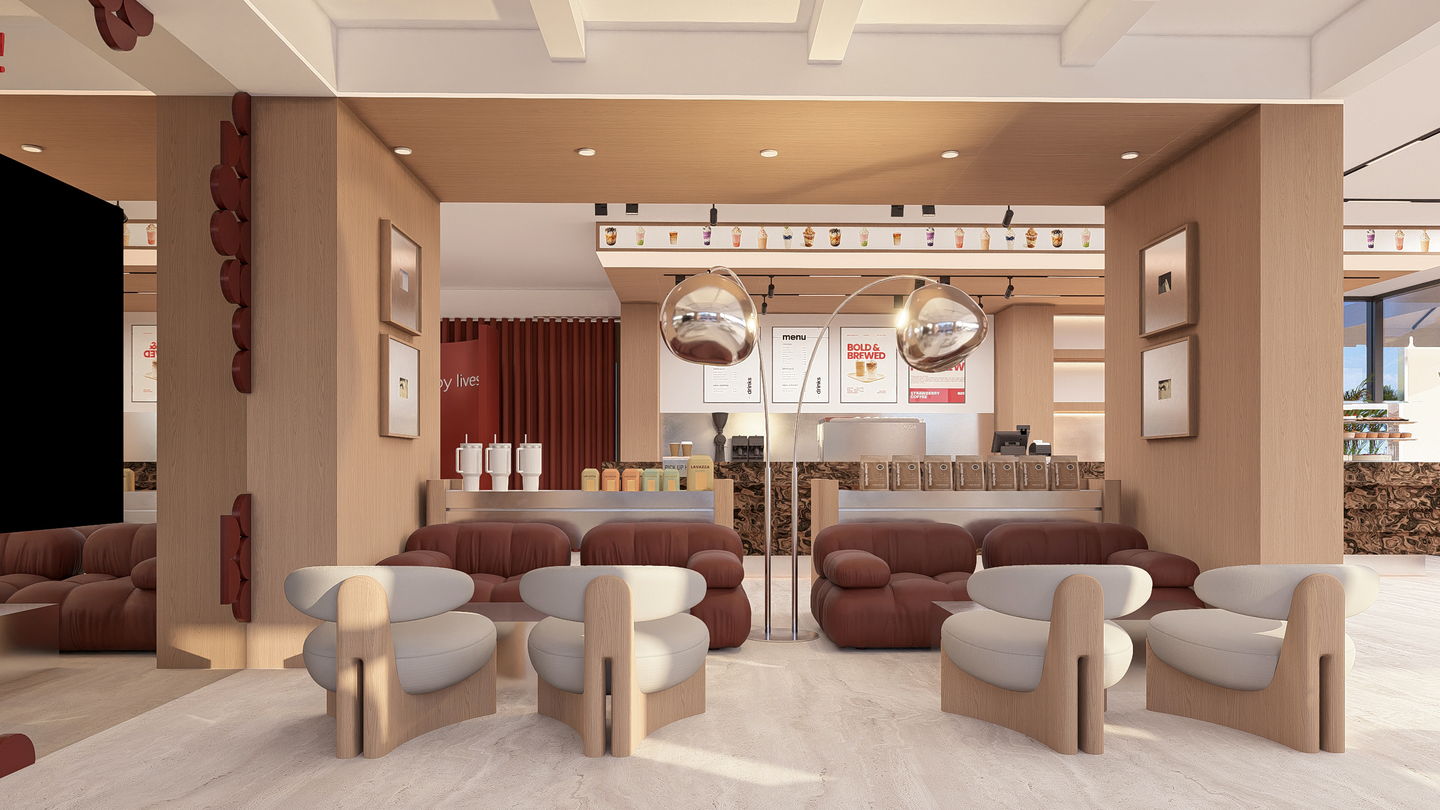 Oxblood deri koltuklar ve krom detaylı sehpalarla düzenlenmiş lounge alanı